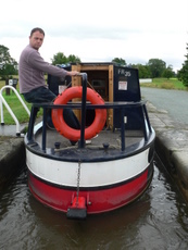 Our boats are cruise astern with the Tiller at the rear of the Canal Boat Our boats are cruise astern with the Tiller at the rear of the Canal Boat